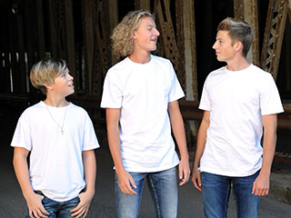 Three boys in white